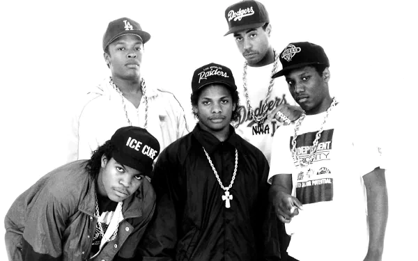 Black and white HD desktop wallpaper featuring the hip-hop group N.W.A., showcasing five members in iconic 1980s and 1990s streetwear and caps.
