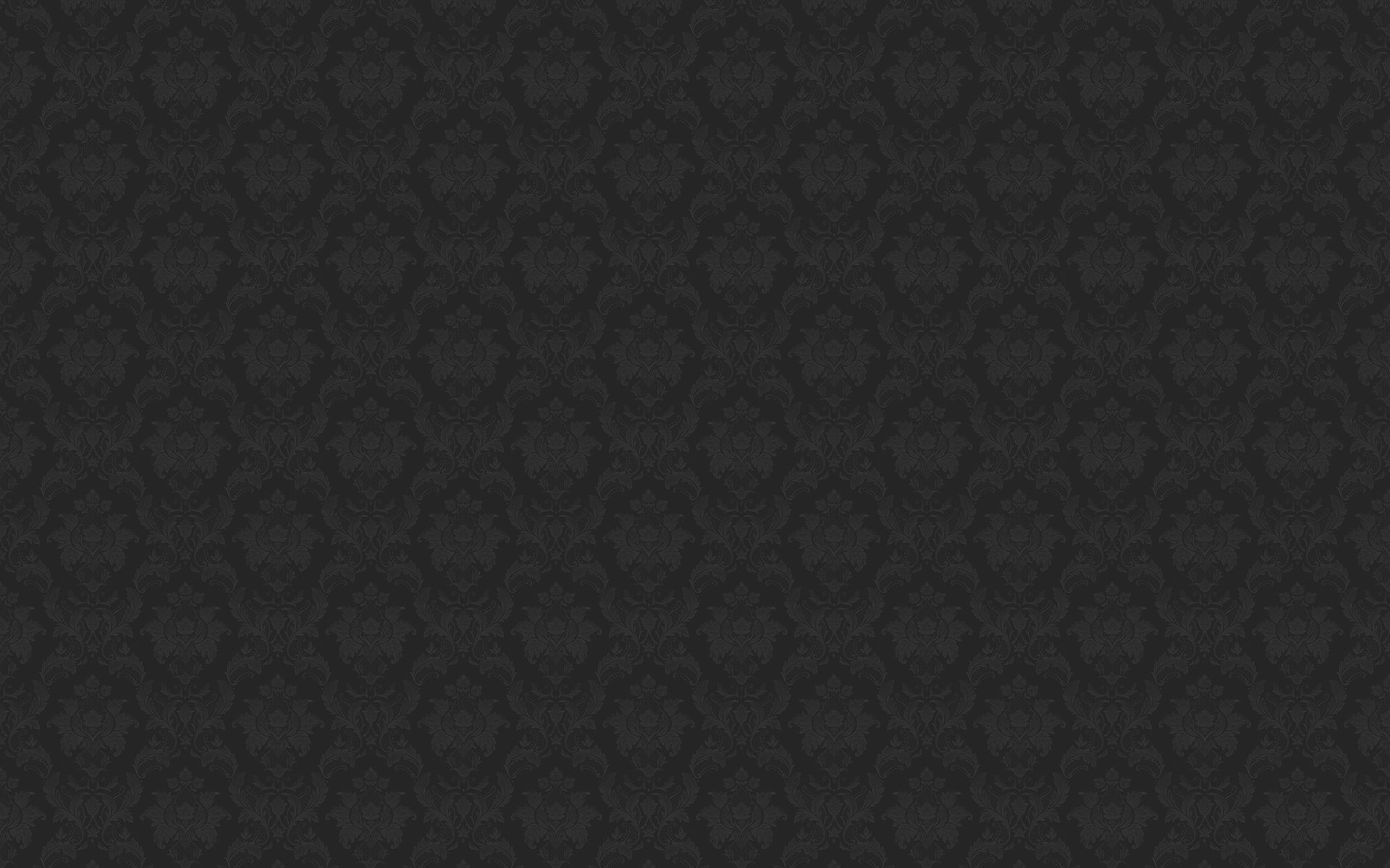 HD PC desktop wallpaper: dark charcoal damask-style abstract pattern with subtle repeating ornamental motif and textured gradient.