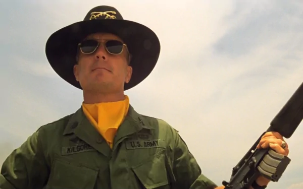 A commanding figure in military attire, wearing sunglasses and a wide-brimmed hat, stands with a rifle, embodying the intense atmosphere of *Apocalypse Now*.