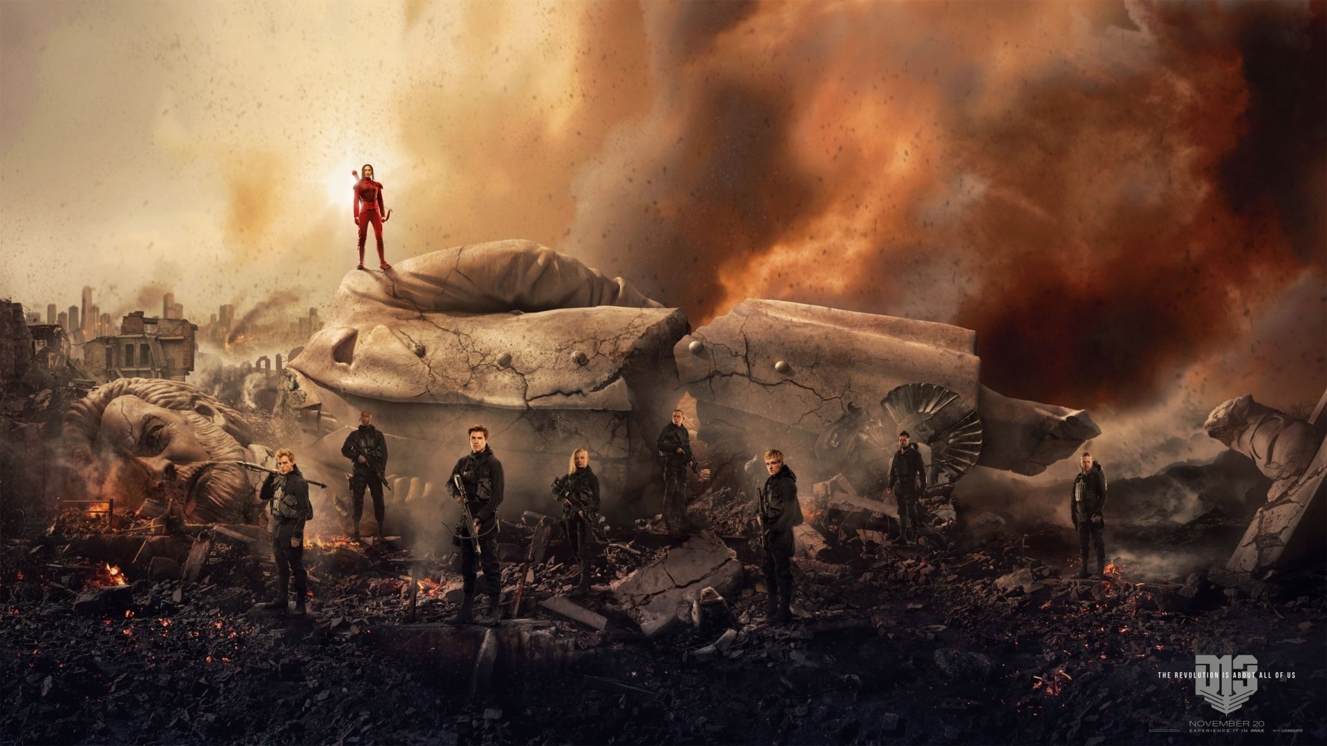 Movie: The Hunger Games: Mockingjay - Part 2 — HD PC desktop wallpaper: Katniss in red atop a ruined statue, soldiers and smoke on a fiery, war-torn battlefield.