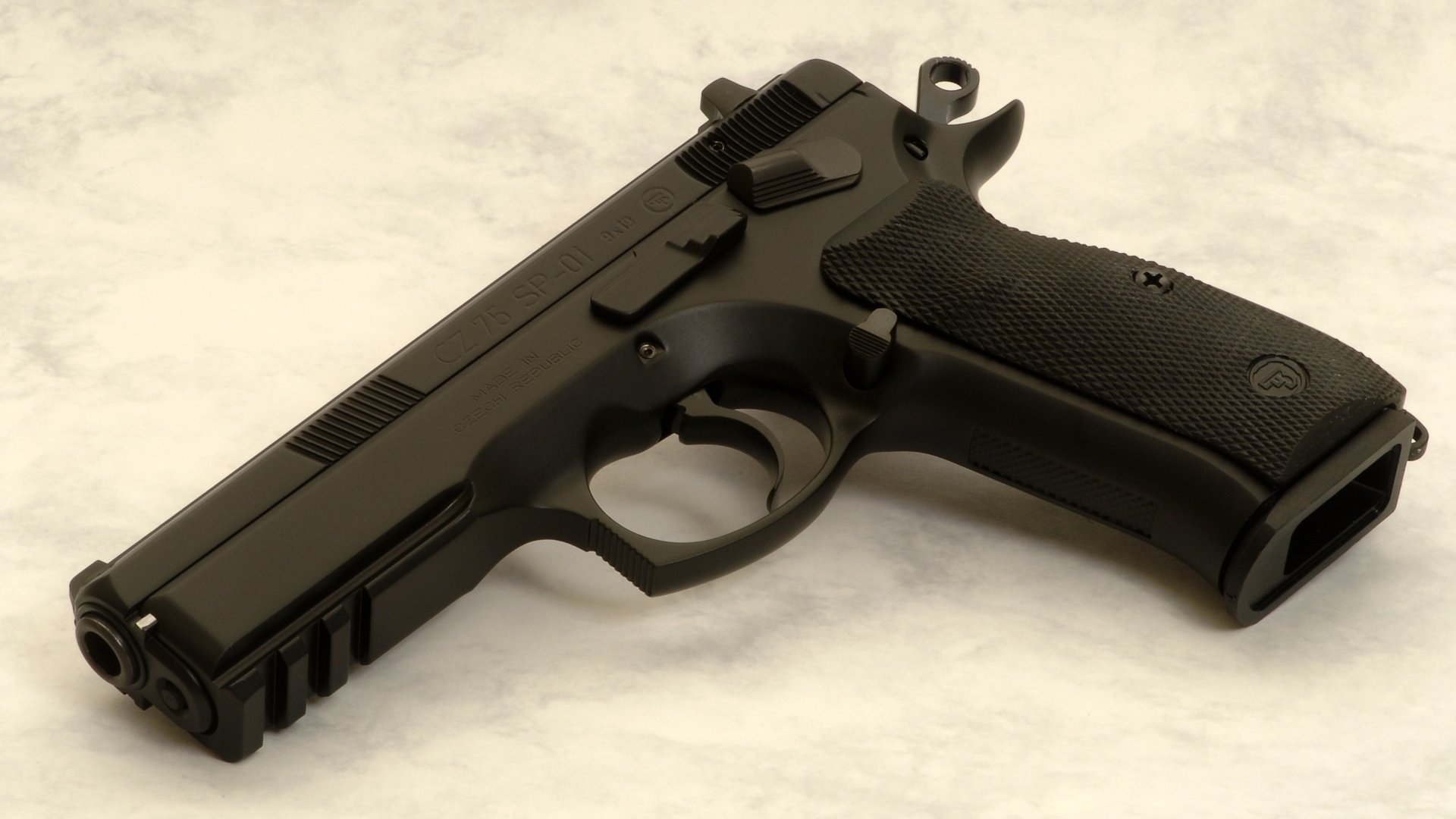 A detailed HD wallpaper featuring a CZ 75 SP01 pistol, showcasing its sleek design and craftsmanship against a subtle background.