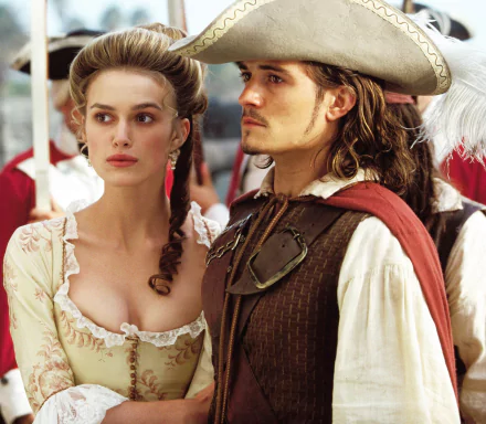 Elizabeth Swann and Will Turner, portrayed by Keira Knightley and Orlando Bloom, are featured in this HD wallpaper from Pirates of the Caribbean: The Curse of the Black Pearl.