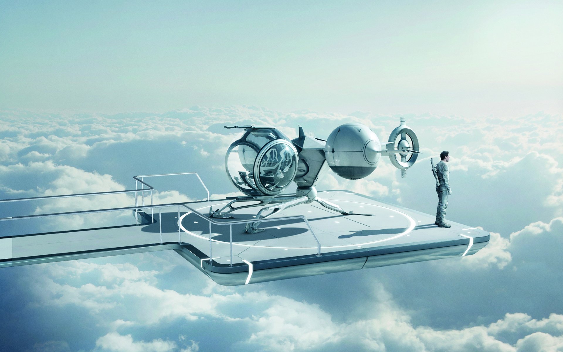 HD PC desktop wallpaper from the movie Oblivion (2013), featuring Tom Cruise standing on a futuristic platform above the clouds with a hovering aircraft.