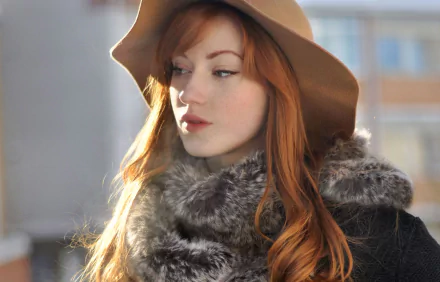 Red-haired woman in a wide-brim hat and fur-collared coat, soft natural light — HD PC desktop wallpaper background.