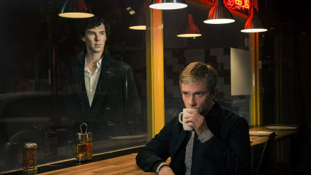 A dramatic scene from the TV show Sherlock, featuring a character seated at a bar, gazing thoughtfully at a reflection of Sherlock Holmes in the window. HD wallpaper for desktop use.