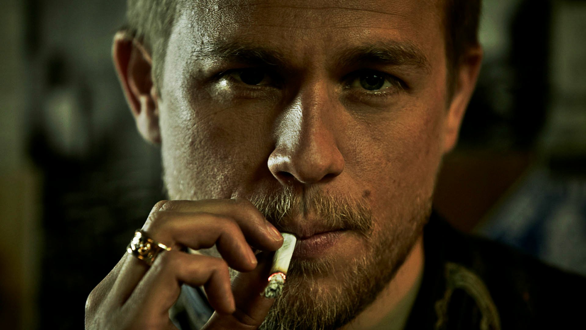 Gritty close-up of a man smoking — HD PC desktop wallpaper/background from the TV show Sons of Anarchy.