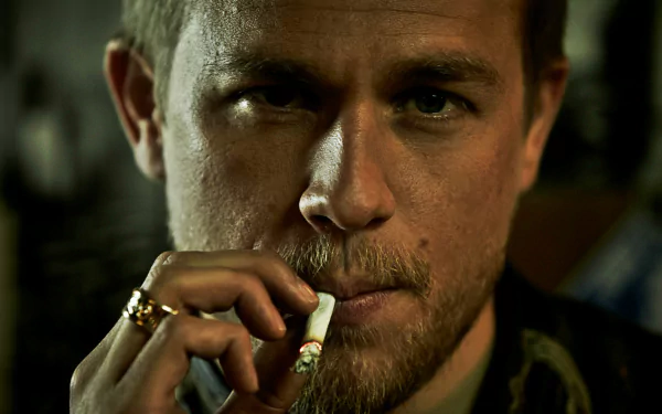 Gritty close-up of a man smoking — HD PC desktop wallpaper/background from the TV show Sons of Anarchy.