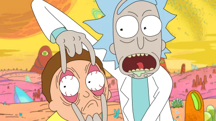HD desktop wallpaper featuring Rick Sanchez and Morty Smith from the TV show Rick and Morty. Rick holds Morty’s eyes open wide with a colorful alien landscape in the background.