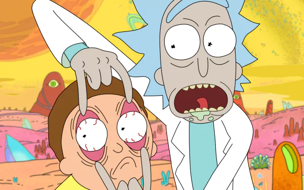 HD desktop wallpaper featuring Rick Sanchez and Morty Smith from the TV show Rick and Morty. Rick holds Morty’s eyes open wide with a colorful alien landscape in the background.