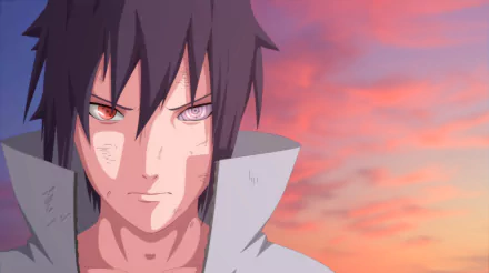 A striking HD wallpaper of Sasuke Uchiha from the anime Naruto, featuring his intense expression and dynamic background of vibrant sunset colors.