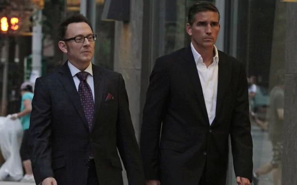 Jim Caviezel and Michael Emerson in a scene from the TV show Person of Interest, featured in an HD PC desktop wallpaper and background.