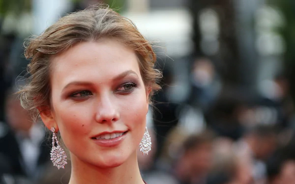 Close-up of celebrity Karlie Kloss wearing elegant earrings, captured in sharp detail for a 4K Ultra HD PC desktop wallpaper and background.
