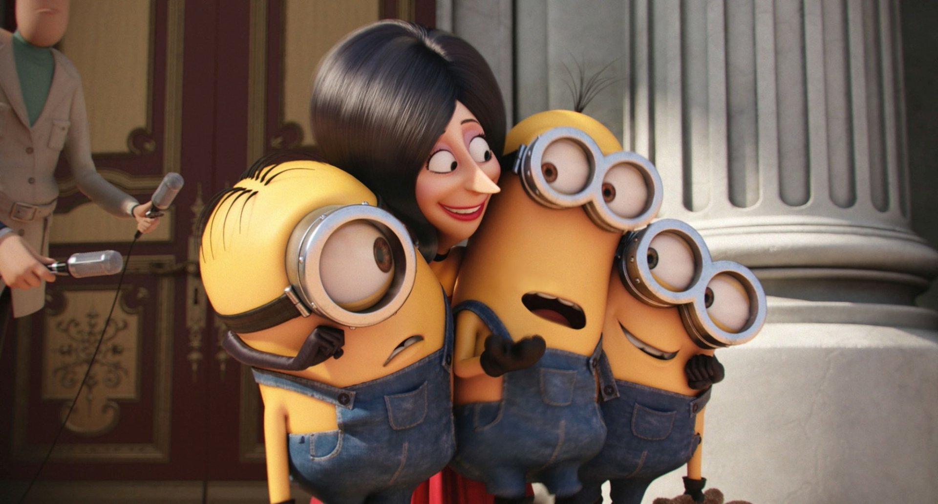 Scarlet Overkill with Kevin, Stuart, and Bob from the Minions movie. This HD desktop wallpaper captures a fun and vibrant scene featuring the beloved characters.