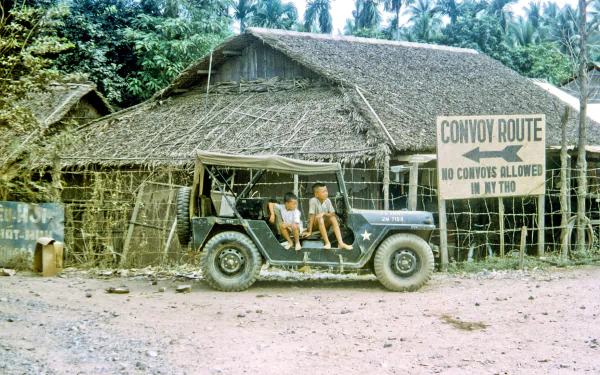  Vietnamese kid in a Mutt Jeep