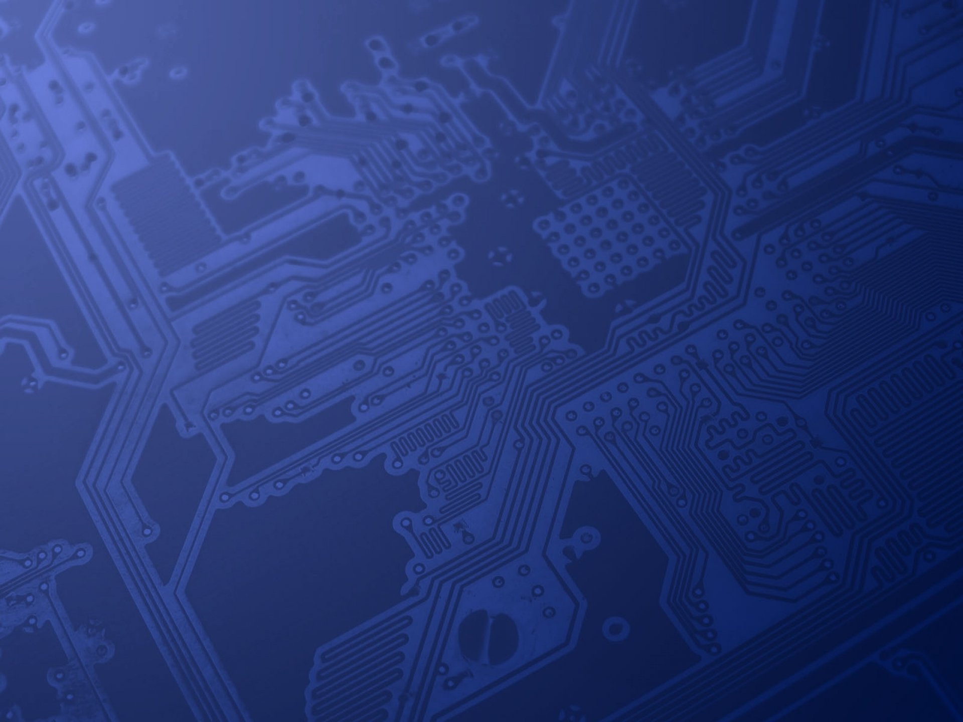 HD PC desktop wallpaper featuring a detailed blue circuit board design, highlighting modern technology and intricate electronic pathways.