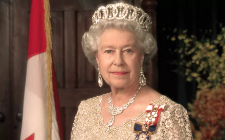 HD PC desktop wallpaper featuring a regal portrait of Queen Elizabeth II wearing a tiara, elegant jewelry, and a decorated gown.
