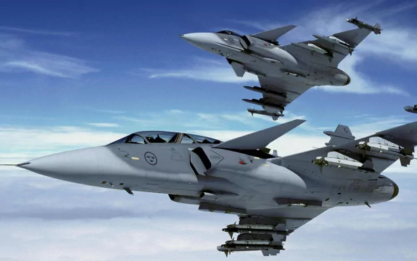 Military Saab JAS 39 Gripen fighters in formation over clouds — 2K Quad HD PC desktop wallpaper/background.