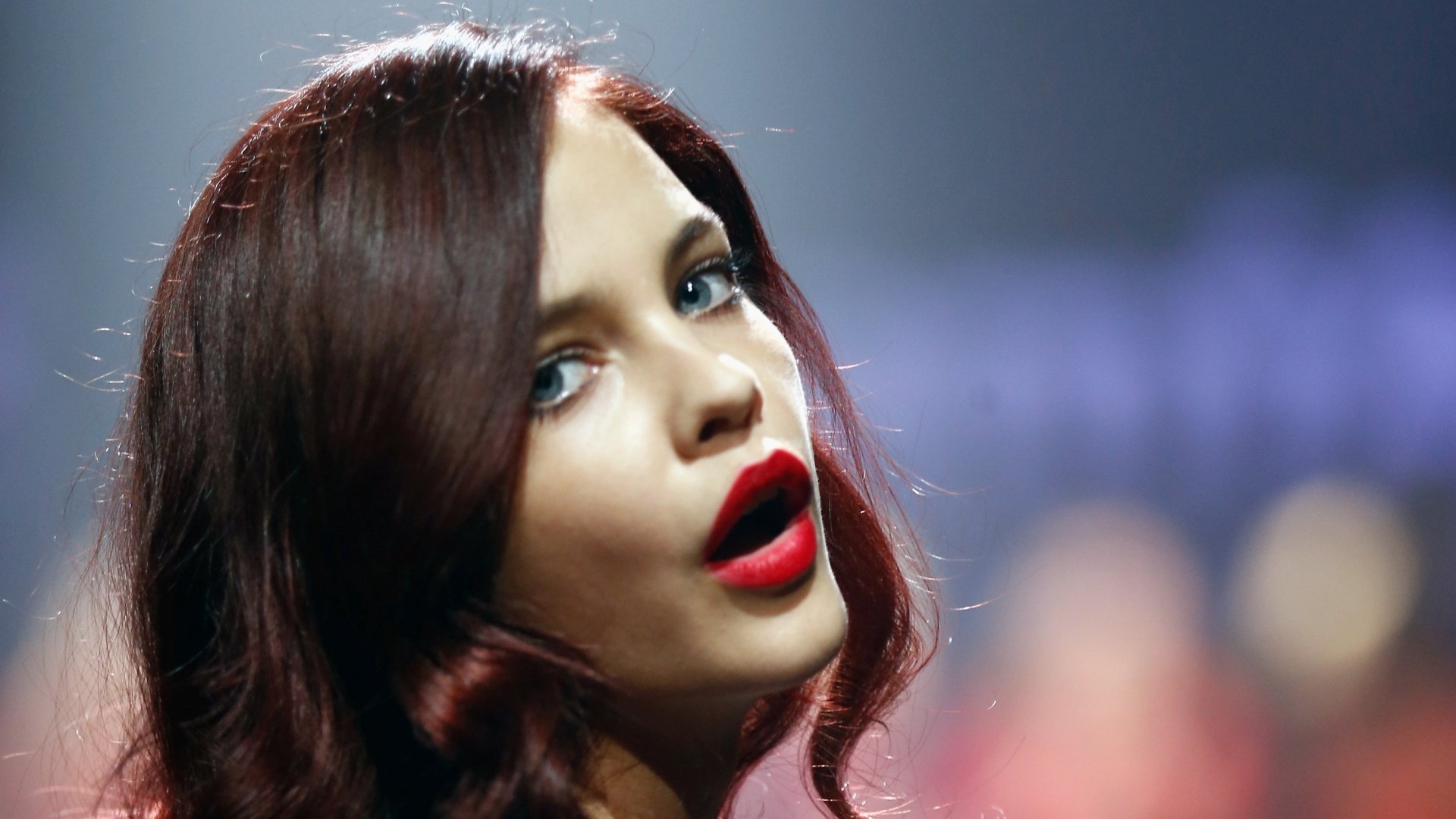 HD desktop wallpaper featuring Hungarian celebrity and model Barbara Palvin with brunette hair and bold red lipstick.