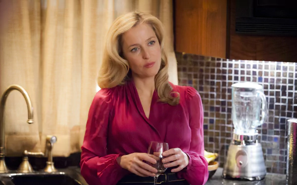 Gillian Anderson in a scene from the TV show Hannibal, featured in an HD PC desktop wallpaper and background.