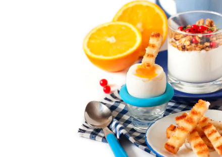HD desktop wallpaper of a breakfast scene featuring orange fruit, cereal with yogurt, milk, and toasted bread on a blue checkered cloth with a spoon.