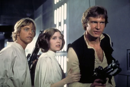 HD desktop wallpaper featuring Luke Skywalker, Princess Leia, and Han Solo from Star Wars Episode IV: A New Hope.