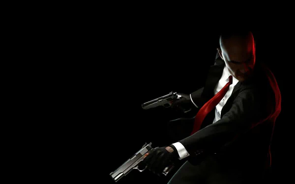 A striking HD wallpaper featuring the iconic character from the video game Hitman, portrayed in a dramatic pose with dual pistols against a dark background.