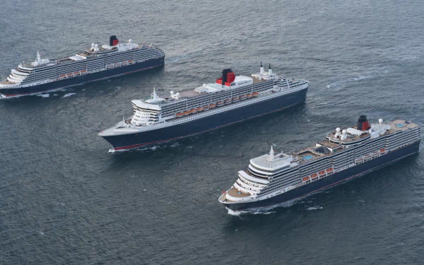HD PC desktop wallpaper: aerial view of three Cunard cruise ships (ocean vehicles), including RMS Queen Mary 2, sailing in formation across the open sea.