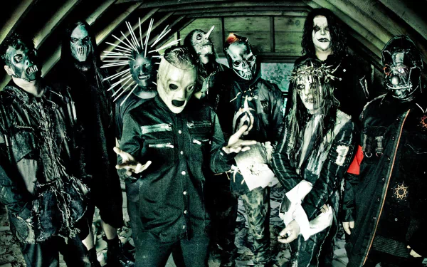 HD wallpaper featuring the band Slipknot, known for their heavy metal, industrial metal, and nu metal styles, captured in a dramatic, dark-themed setting.