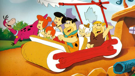 A colorful HD wallpaper featuring Fred Flintstone, Wilma Flintstone, Barney Rubble, Betty Rubble, Bamm-Bamm, and their pet dinosaur, all enjoying a ride in the iconic Flintstone car.