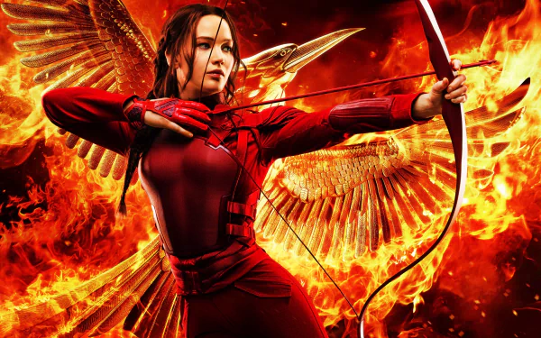 Jennifer Lawrence as Katniss Everdeen in The Hunger Games: Mockingjay - Part 2, poised with a bow against a fiery backdrop, creating a striking HD desktop wallpaper.