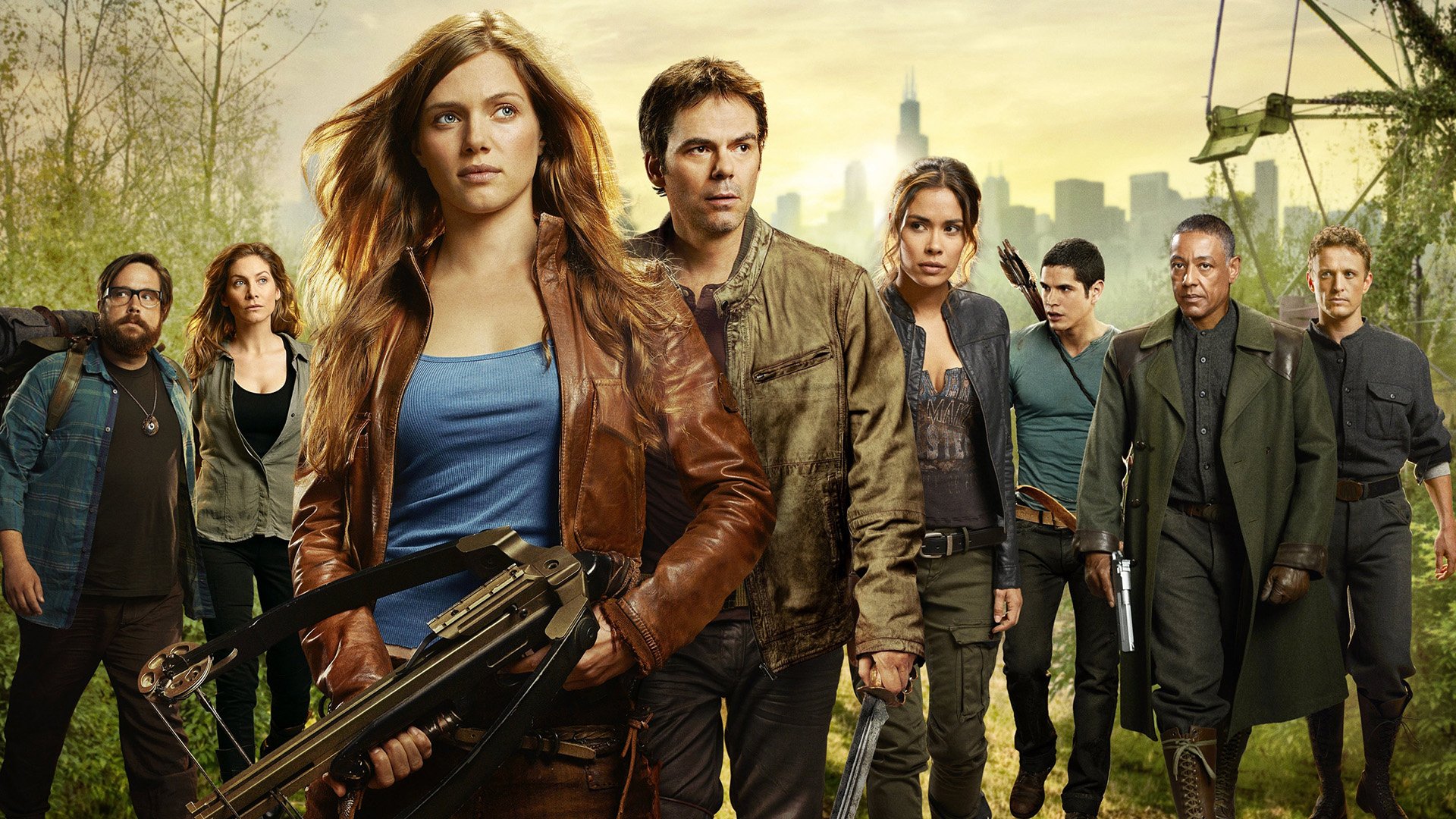 HD desktop wallpaper featuring the cast of the TV show Revolution, showcasing a group of determined characters in a post-apocalyptic setting.