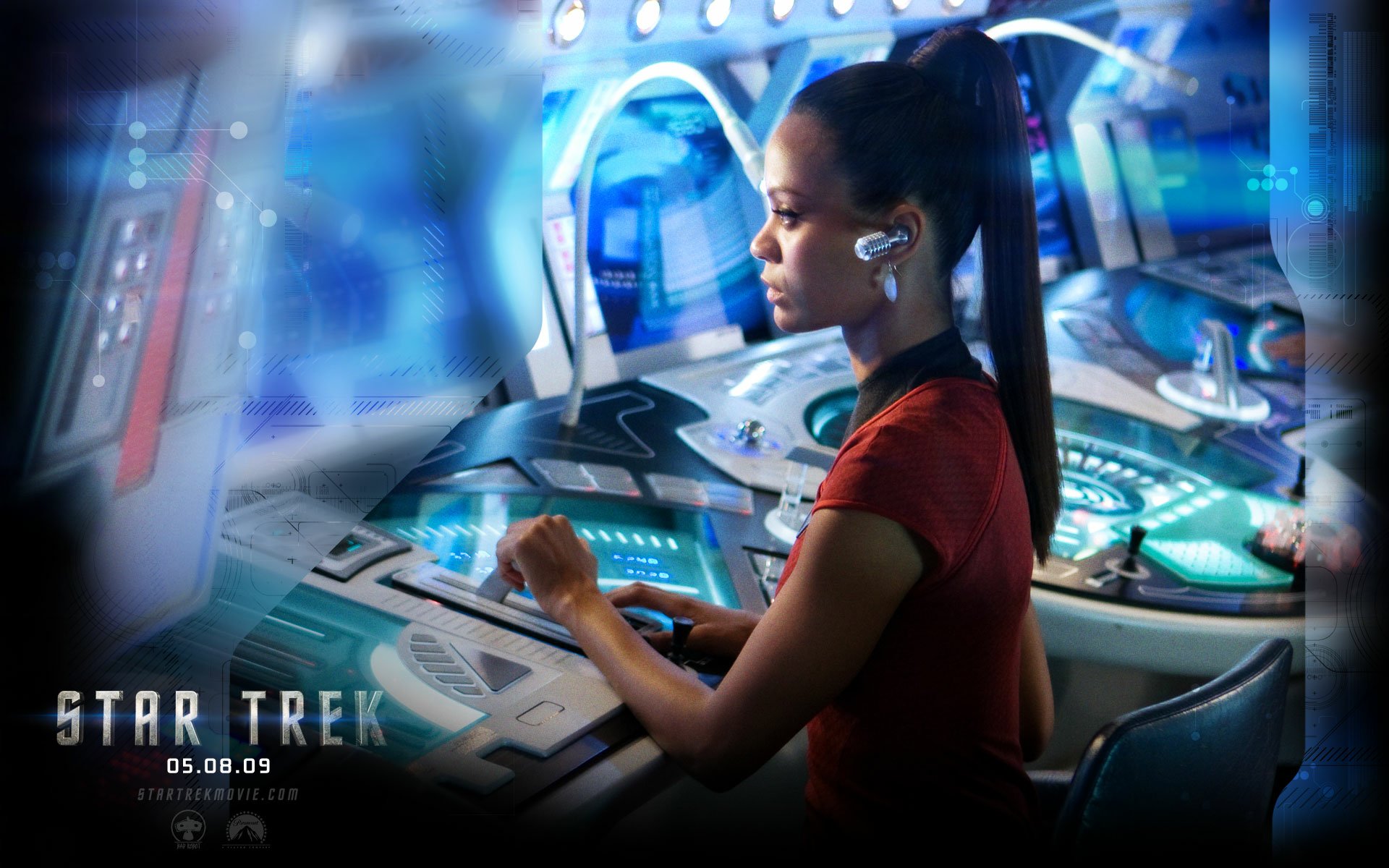 HD desktop wallpaper featuring Zoe Saldana as a Star Trek character, immersed in a futuristic spaceship control room.