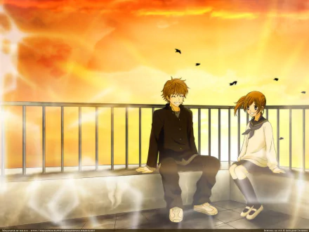 A vibrant HD wallpaper featuring Motoharu Yano and Nanami Takahashi from the anime We Were There, set against a dramatic sunset backdrop.