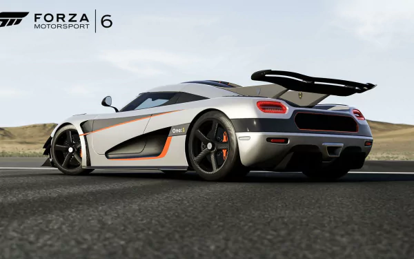 HD PC desktop wallpaper featuring a sleek sports car from the video game Forza Motorsport 6 on an open road under a clear sky.