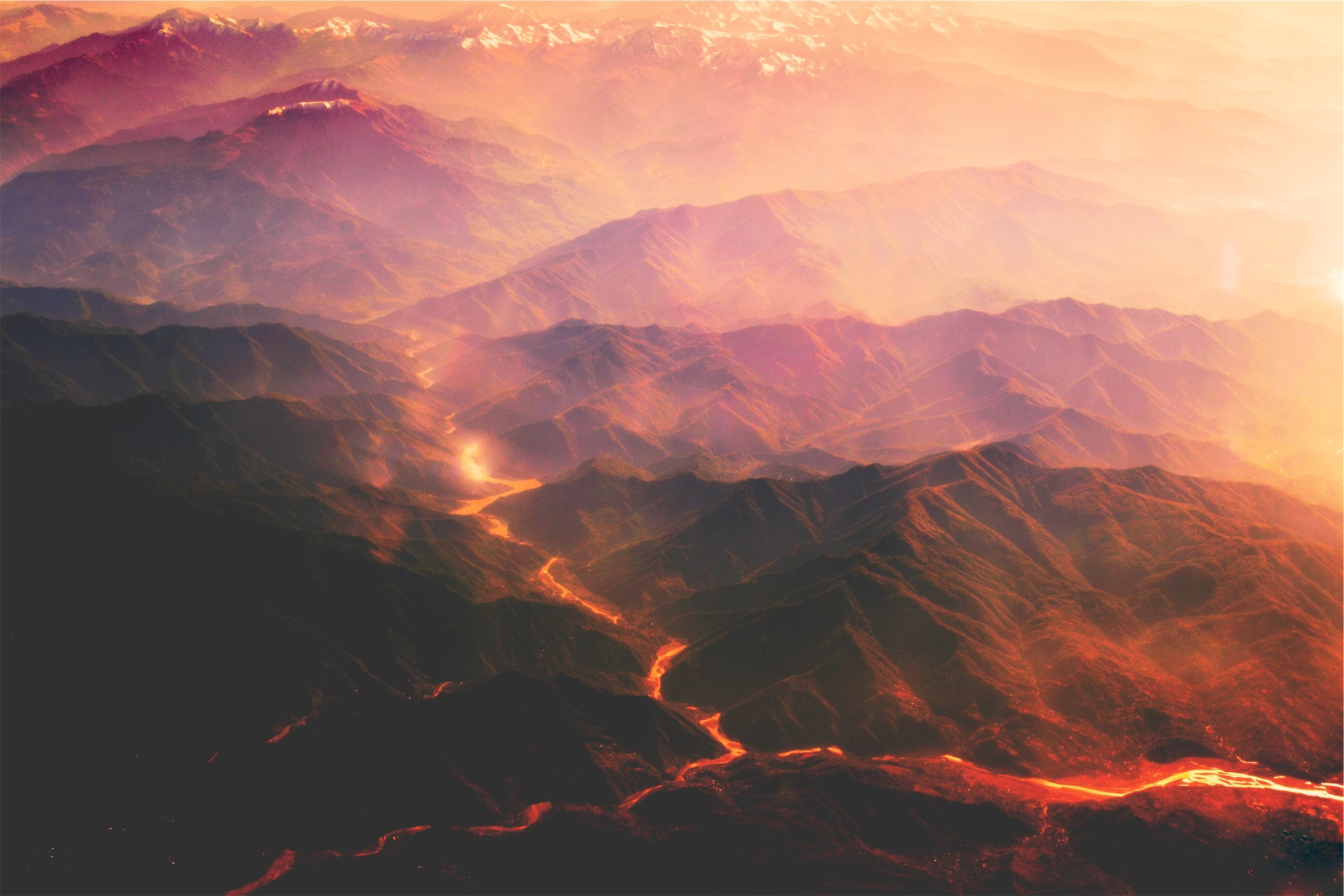 Molten lava makes a river through the mountains