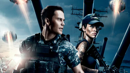 High-definition wallpaper featuring Taylor Kitsch and Rihanna from the movie Battleship, showcasing an intense scene with military elements and a dramatic backdrop.