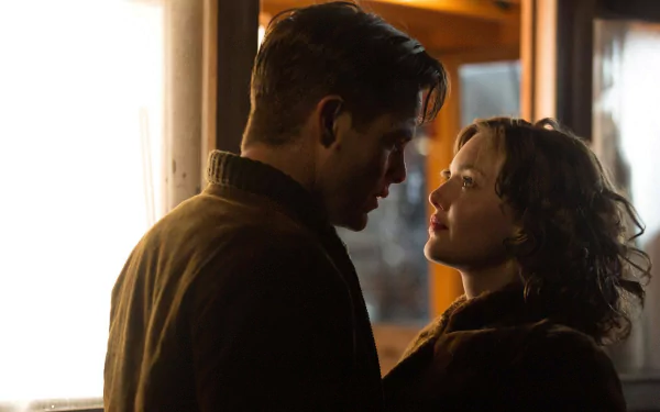 HD desktop wallpaper featuring Holliday Grainger and Chris Pine in a close, intimate scene from the movie The Finest Hours.