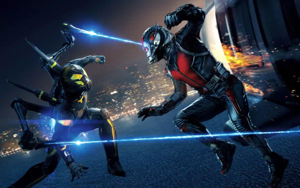 HD PC desktop wallpaper depicting an intense Ant-Man movie fight scene with two armored characters clashing on a rooftop at night.