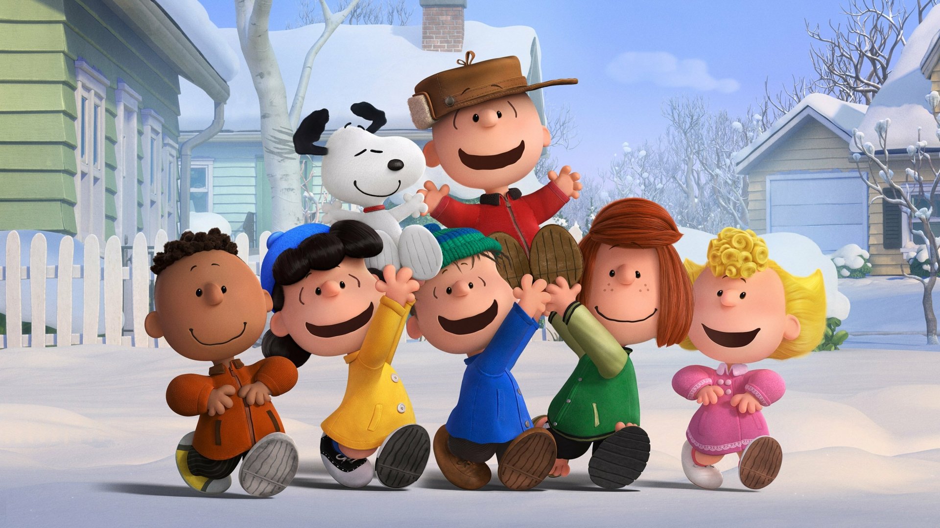 A cheerful group of beloved characters from The Peanuts Movie poses in a snowy landscape, with Charlie Brown and Snoopy front and center, capturing the spirit of friendship and fun.