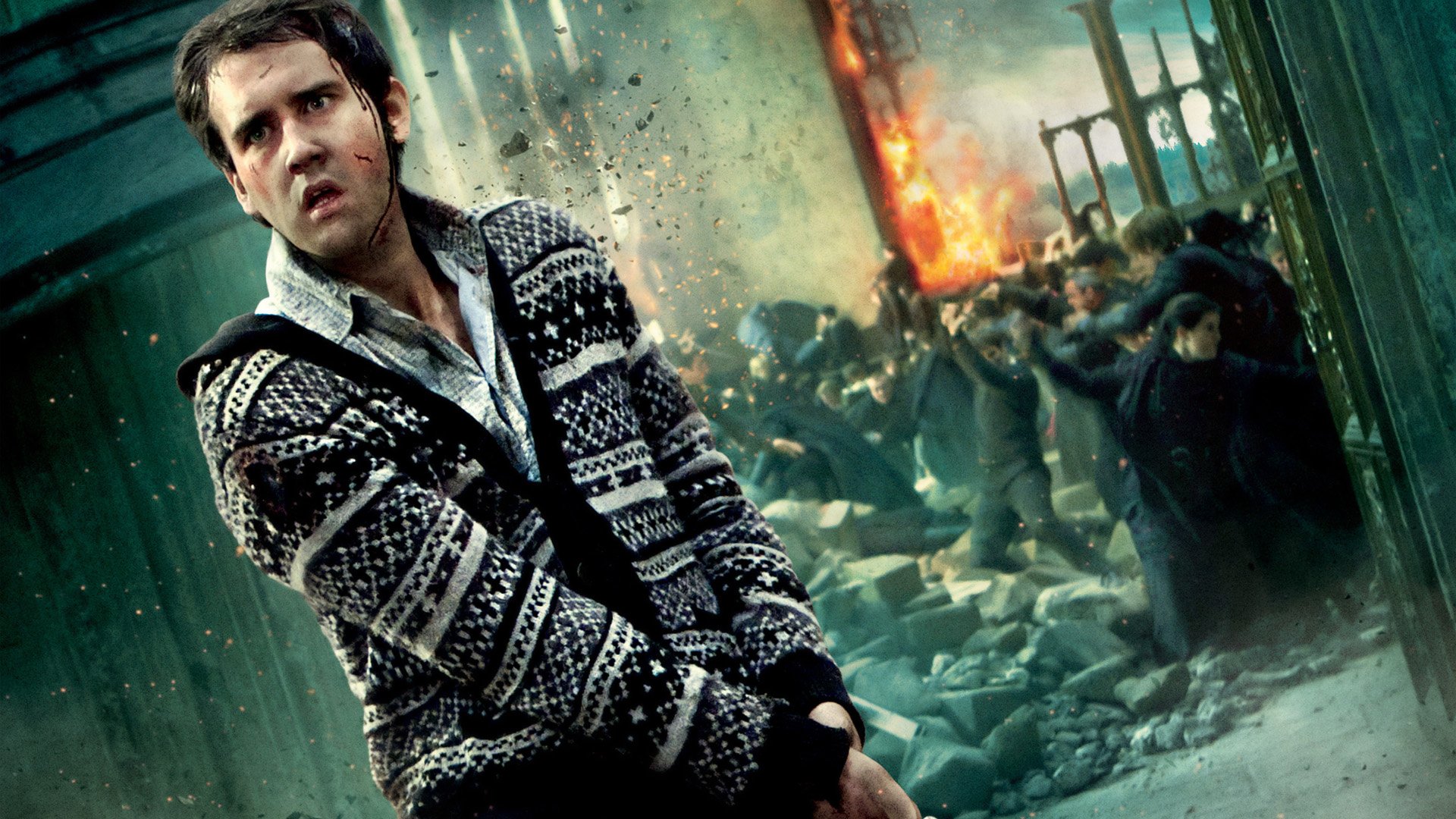 HD PC desktop wallpaper from the movie Harry Potter and the Deathly Hallows: Part 2, featuring a tense scene with a character in the foreground amid chaos and fire.