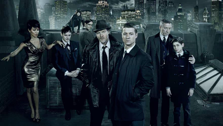 4K Ultra HD desktop wallpaper featuring the main cast of Gotham TV Show standing against a dark, moody city skyline.