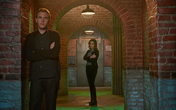 HD PC desktop wallpaper featuring Agents of S.H.I.E.L.D. characters standing in a brick-arched corridor with serious expressions, highlighting the show's intense atmosphere.