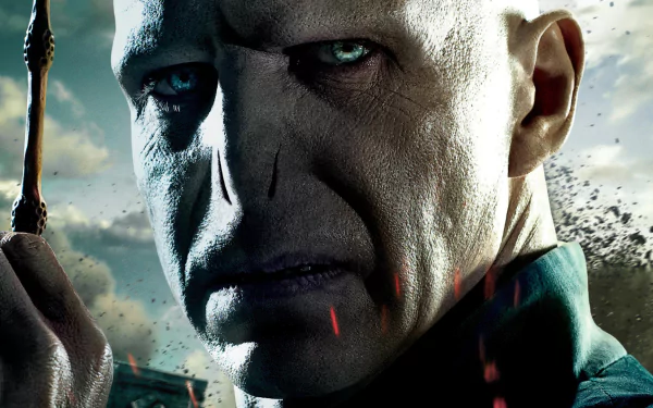 HD PC desktop wallpaper featuring a close-up of Lord Voldemort from the movie Harry Potter and the Deathly Hallows: Part 2, with a dark, intense atmosphere.