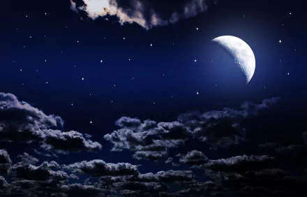 HD PC desktop wallpaper showing a night sky with a crescent moon, scattered stars, and clouds, highlighting the serene beauty of nature.