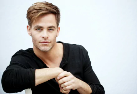 Portrait of American actor and celebrity Chris Pine in a relaxed pose, featured in a 4K Ultra HD PC desktop wallpaper and background.