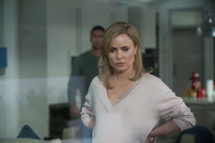 Radha Mitchell portrays Leah Banning in a tense moment from the movie London Has Fallen, captured in this striking 4K Ultra HD desktop wallpaper.