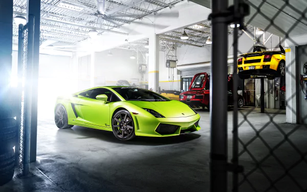 A vibrant green Lamborghini Gallardo parked inside a spacious garage, captured in sharp 4K Ultra HD quality, offering a sleek automotive PC desktop wallpaper and background.