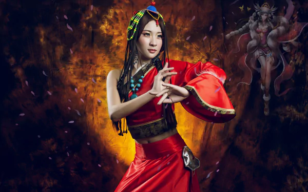 An Asian woman with blue eyes and brunette hair poses in a vibrant traditional costume against a fiery, artistic background in this HD PC desktop wallpaper.