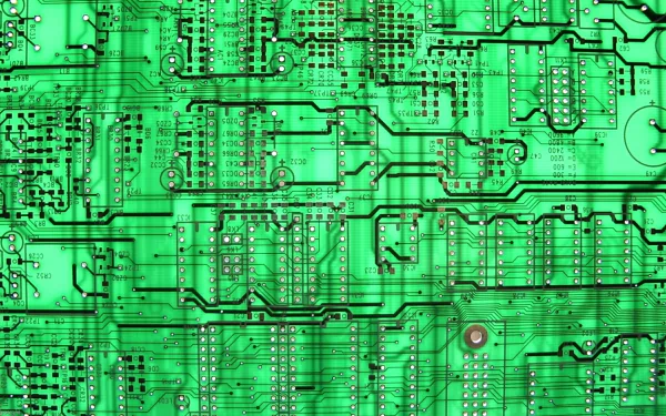 HD desktop wallpaper featuring a detailed green circuit board design, highlighting intricate technology patterns and electronic components.