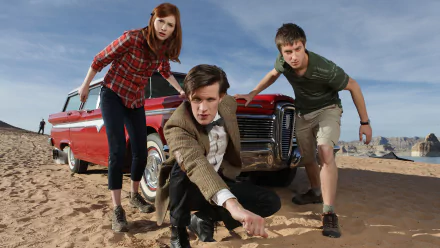 HD desktop wallpaper featuring Doctor Who (2005) characters Amy Pond, Rory Williams, and the Eleventh Doctor, portrayed by Karen Gillan, Arthur Darvill, and Matt Smith.